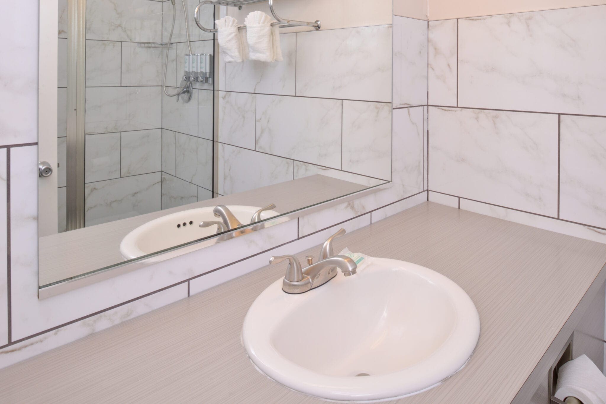 Bathroom sink accommodations at Hotel Ruby Spokane