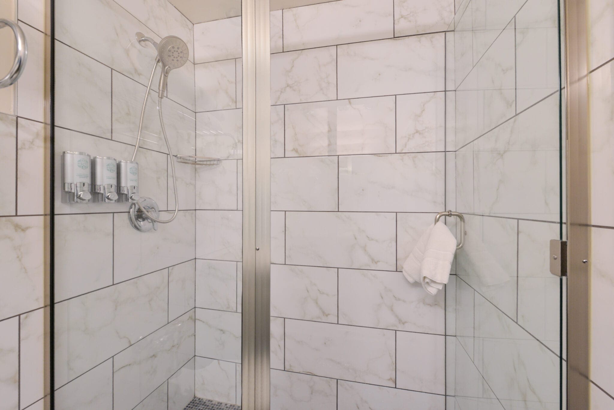 Shower interior at Hotel Ruby Spokane