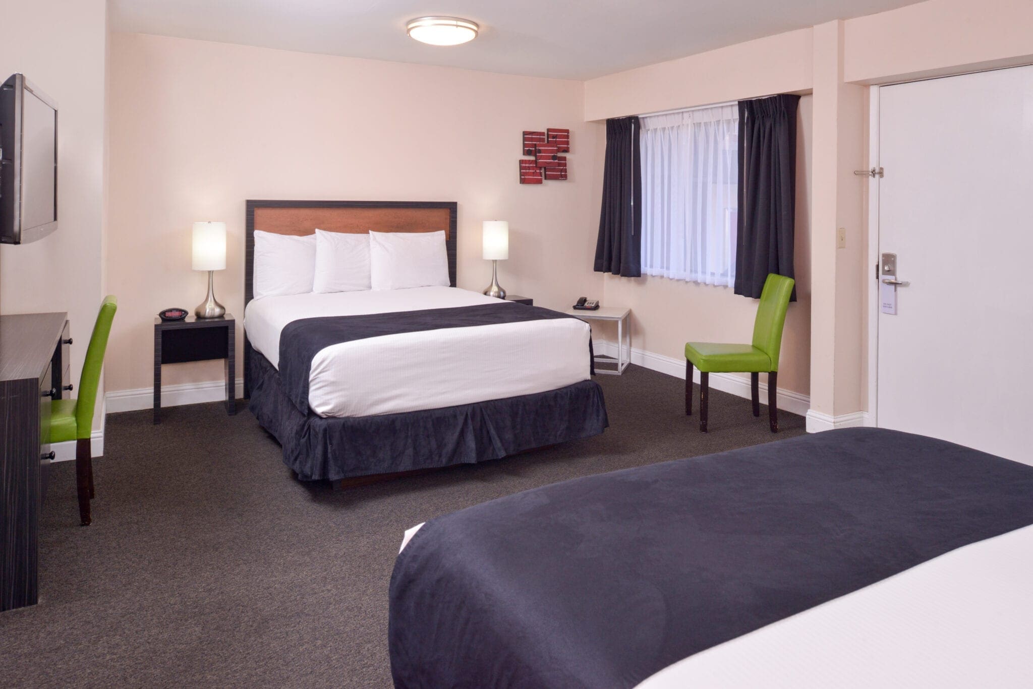 Premium double queen with two beds at Hotel Ruby Spokane.