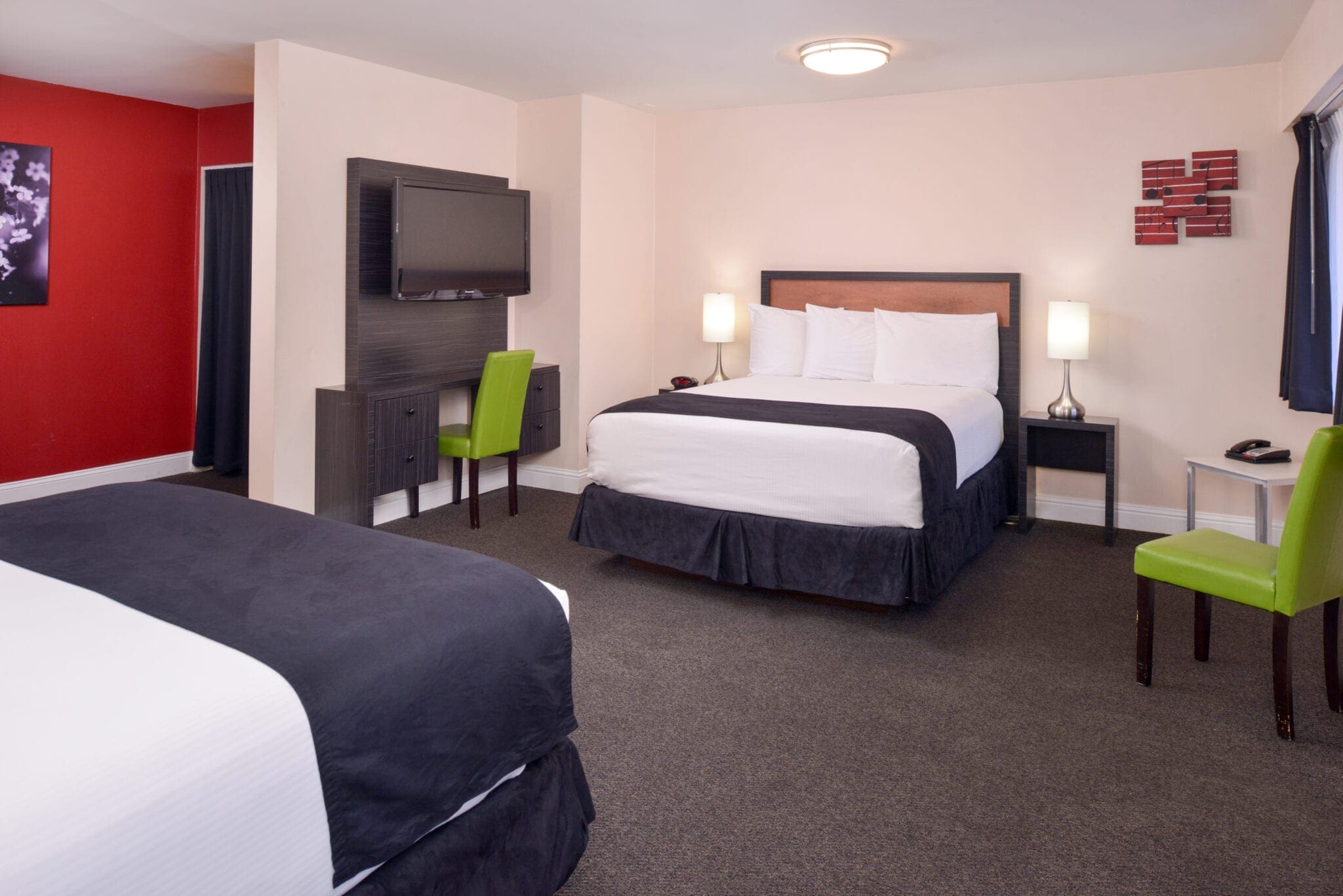 Premium double queen with two beds with desk at Hotel Ruby Spokane.