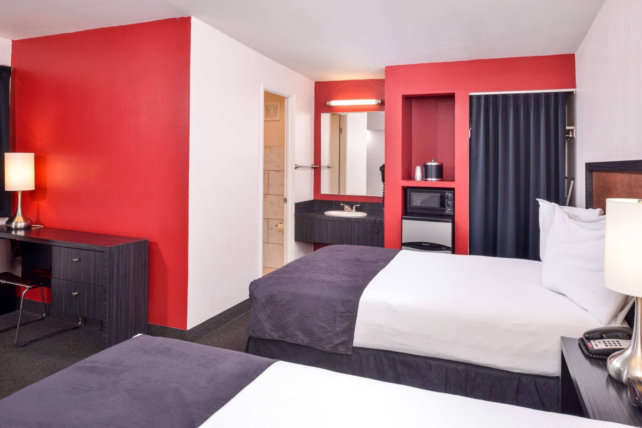 Ruby Hotel's Two Full-Size Beds room features two full-size beds and will accommodate up to 4 adults.